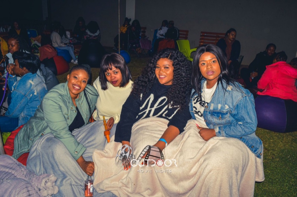 Friends enjoying movie night