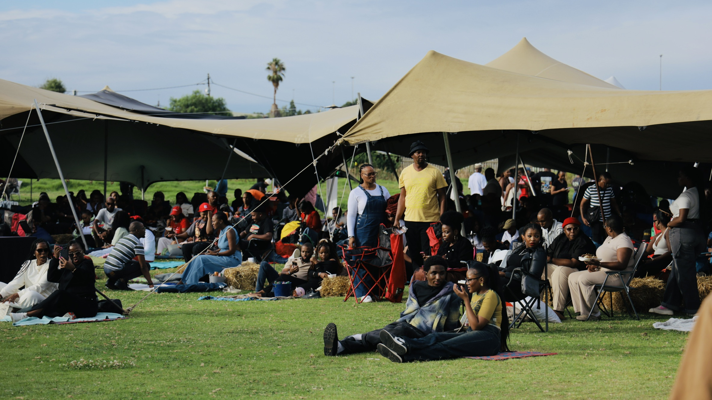 Community gathering at outdoor cinema