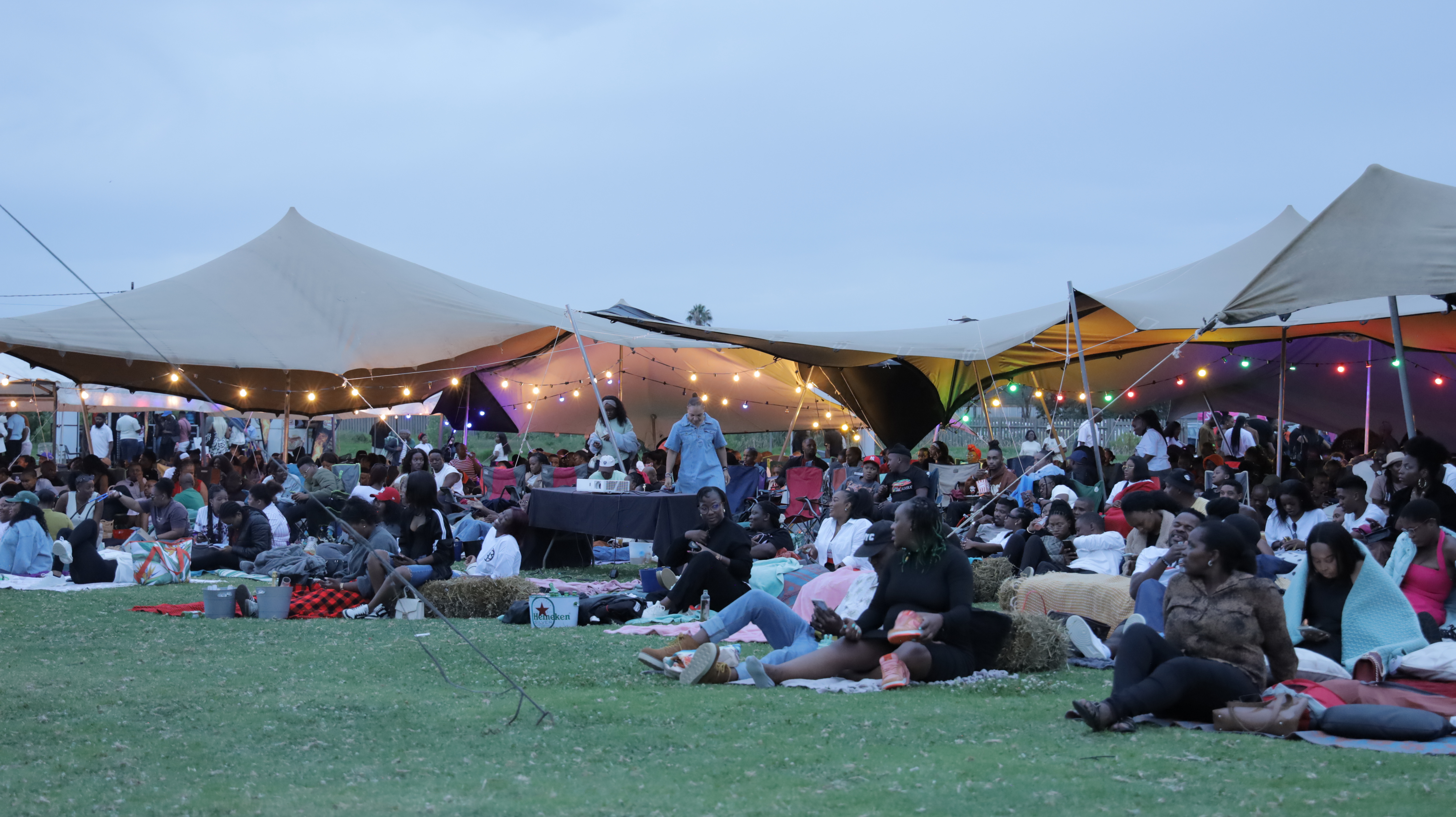 Big crowd enjoying outdoor movie